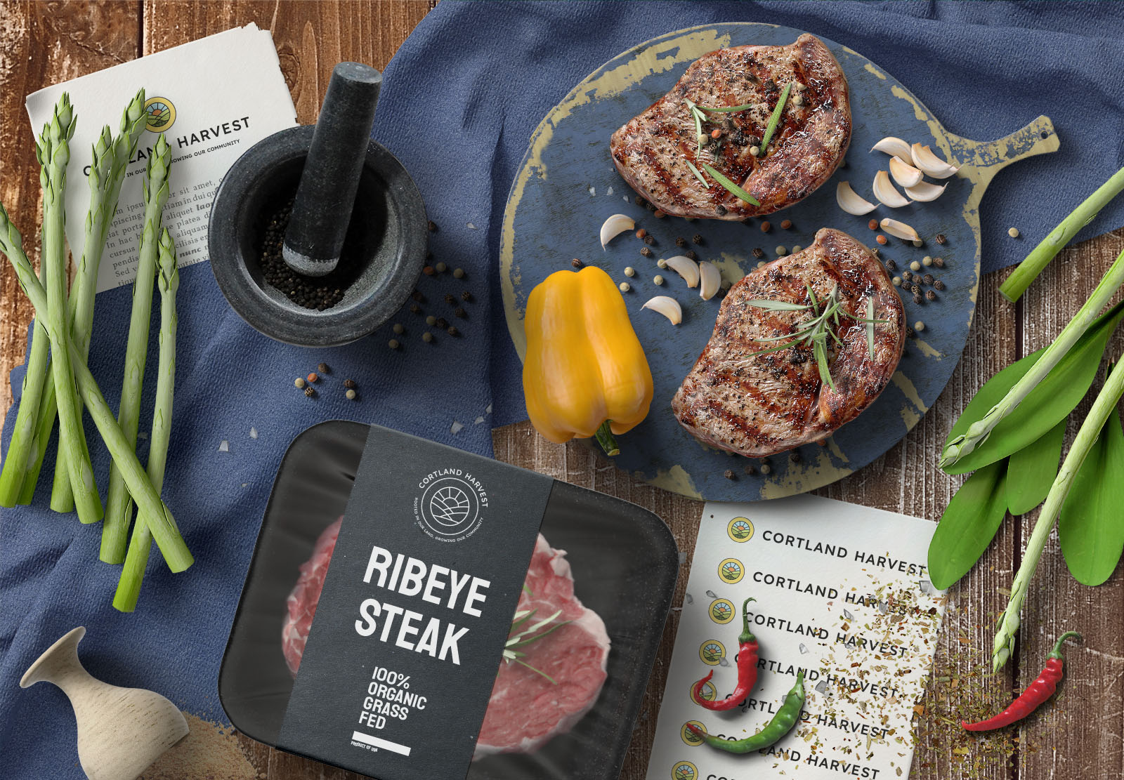 Cortland Harvest branding on table with steaks